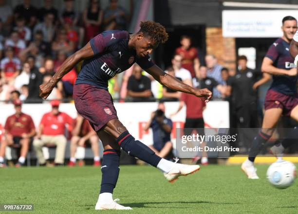 Jeff Reine-Adelaide shoots and scores a goal for Arsenal during the match between Borehamwood and Arsenal at Meadow Park on July 14, 2018 in...