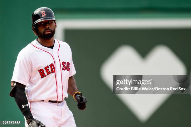 Jackie Bradley Jr. #19 of the Boston Red Sox reacts after hitting a game tying RBI double during the ninth inning of a game against the Toronto Blue...