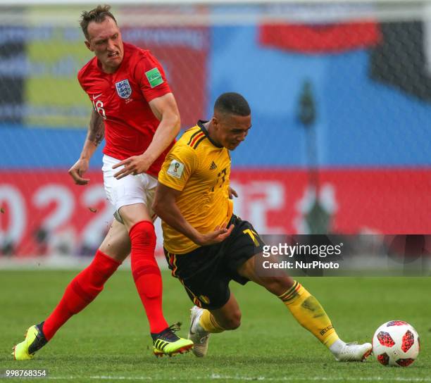 Phil Jones of the England national football team and Youri Tielemans of the Belgium national football team vie for the ball during the 2018 FIFA...