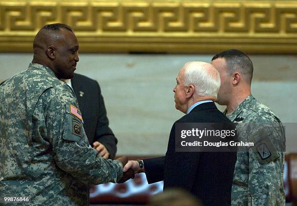 John McCain, R-AZ., greets some of the troops that attended the Congressional Remembrance Ceremony Thursday, March 13, 2008 to honor the five years...