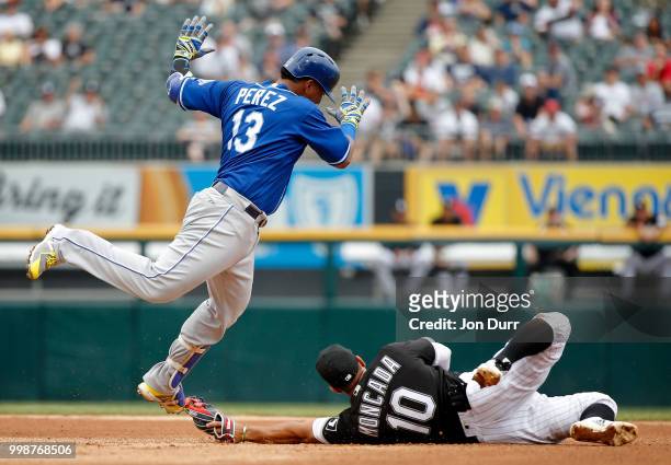Yoan Moncada of the Chicago White Sox tags out Salvador Perez of the Kansas City Royals at second base during the fourth inning at Guaranteed Rate...