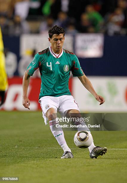 Hector Moreno of Mexico passes the ball against Senegal during an international friendly at Soldier Field on May 10, 2010 in Chicago, Illinois....