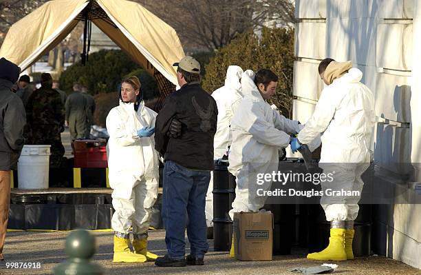 The Marine haz-mat team from Dover Delaware along with the Coast Guard and the U.S. Capitol Police prepare to enter the Russell Senate Office...