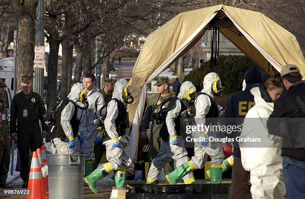 The Marine haz-mat team from Dover Delaware along with the Coast Guard and the U.S. Capitol Police prepare to enter the Russell Senate Office...