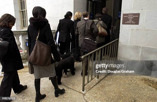 Staffers and public prepare to enter the Russell Senate Office Building after the building was declared safe after the ricin scare.