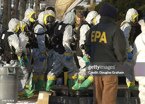 The Marine haz-mat team from Dover Delaware along with the Coast Guard and the U.S. Capitol Police prepare to enter the Russell Senate Office...