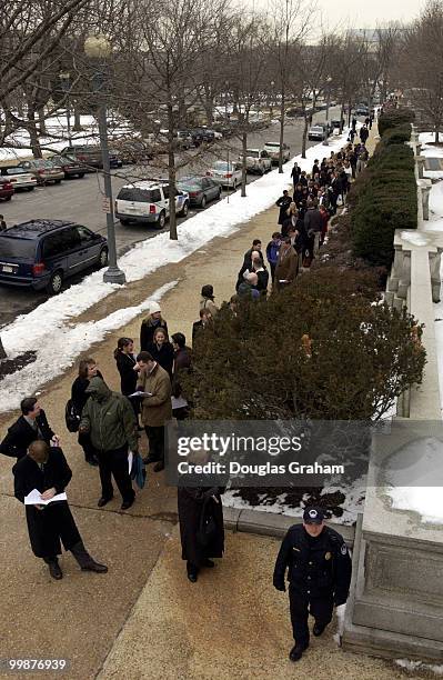 Staffers and public prepare to enter the Russell Senate Office Building after the building was declared safe after the ricin scare.