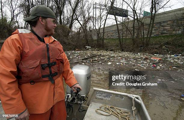 Chris Fenderson, of Living Lands & Water shows the media some of the areas that will be targets for the cleanup of the Potomac and Anacostia Rivers....