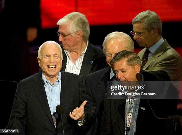 John McCain, Joe Lieberman and Lindsey Graham stands on stage during a sound check for the Republican National Convention at the Xcel Energy Center...