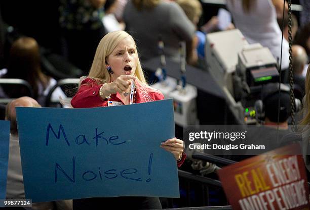 Volunteer tries to motivate the crowd on day three of the Republican National Convention at the Xcel Energy Center on September 3, 2008 in St. Paul,...