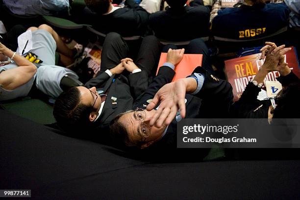 Conventioneers hold onto signs as Republican Vice Presidential Presumptive Nominee Sarah Palin speaks on the third day of the Republican National...