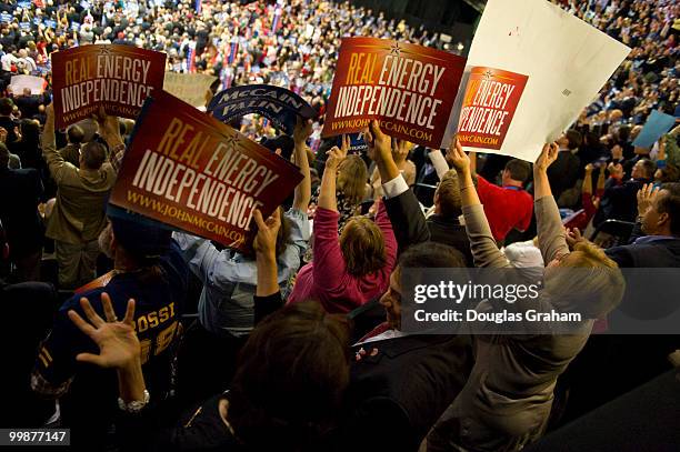 Conventioneers hold up signs as Republican Vice Presidential Presumptive Nominee Sarah Palin speaks on the third day of the Republican National...