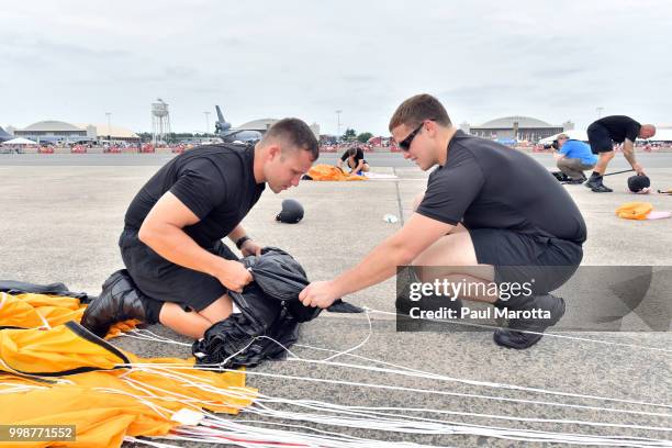 The U.S. Army Parachute Team The Golden Knights prepare for their demonstration jump at 10,500 feet at the 2018 Great New England Air and Space Show...