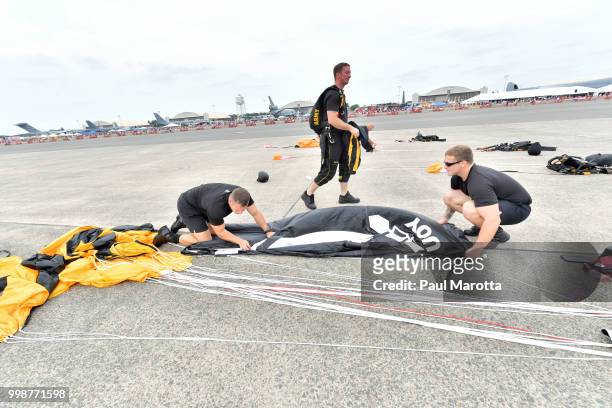 The U.S. Army Parachute Team The Golden Knights prepare for their demonstration jump at 10,500 feet at the 2018 Great New England Air and Space Show...