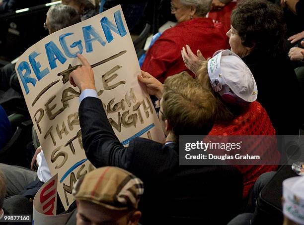 Signs for the Presidential Nominee John McCain are held up in the crowd on the forth day of the Republican National Convention held at the Xcel...