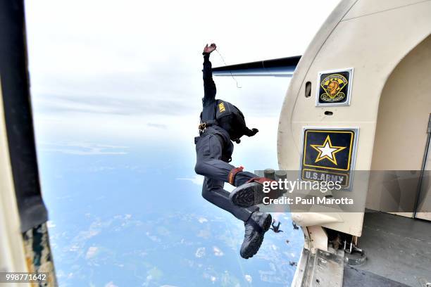 The U.S. Army Parachute Team The Golden Knights prepare for their demonstration jump at 10,500 feet at the 2018 Great New England Air and Space Show...