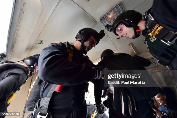 The U.S. Army Parachute Team The Golden Knights prepare for their demonstration jump at 10,500 feet at the 2018 Great New England Air and Space Show...