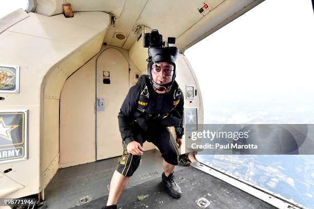 The U.S. Army Parachute Team The Golden Knights prepare for their demonstration jump at 10,500 feet at the 2018 Great New England Air and Space Show...