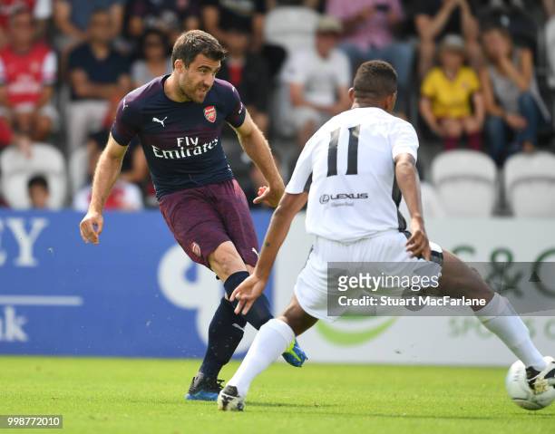 Sokratis of Arsenal takes on Angelo Balanta of Boreham Wood during the pre-season friendly between Boreham Wood and Arsenal at Meadow Park on July...