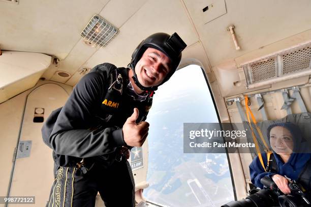 The U.S. Army Parachute Team The Golden Knights prepare for their demonstration jump at 10,500 feet at the 2018 Great New England Air and Space Show...