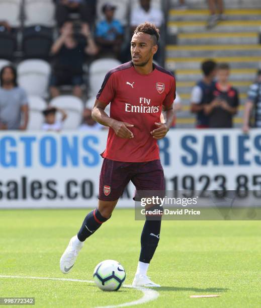 Pierre-Emerick Aubameyang of Arsenal warms up before the match between Borehamwood and Arsenal at Meadow Park on July 14, 2018 in Borehamwood,...