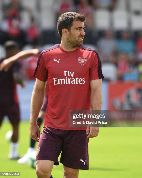 Sokratis Papastathopoulos of Arsenal warms up before the match between Borehamwood and Arsenal at Meadow Park on July 14, 2018 in Borehamwood,...
