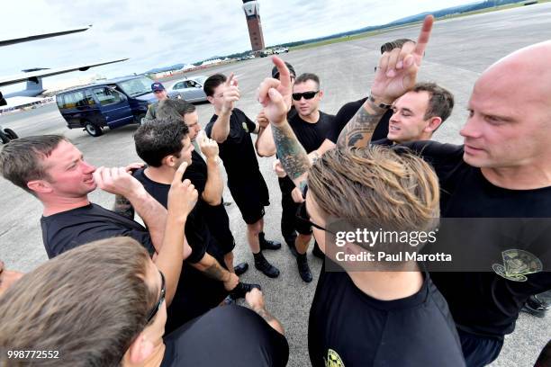 The U.S. Army Parachute Team The Golden Knights prepare for their demonstration jump at 10,500 feet at the 2018 Great New England Air and Space Show...