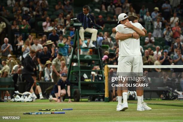 Player Mike Bryan and US player Jack Sock celebrate after beating South Africa's Raven Klaasen and New Zealand's Michael Venus 6-3, 7-6, 6-3, 5-7,...