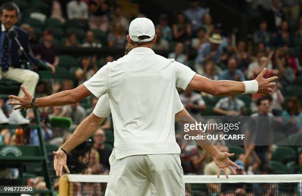 Player Mike Bryan and US player Jack Sock celebrate after beating South Africa's Raven Klaasen and New Zealand's Michael Venus 6-3, 7-6, 6-3, 5-7,...