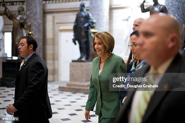 The Speaker of the House Nancy Pelosi, D-CA., makes her way through Statuary Hall in the U.S. Capirol. March 17, 2010.