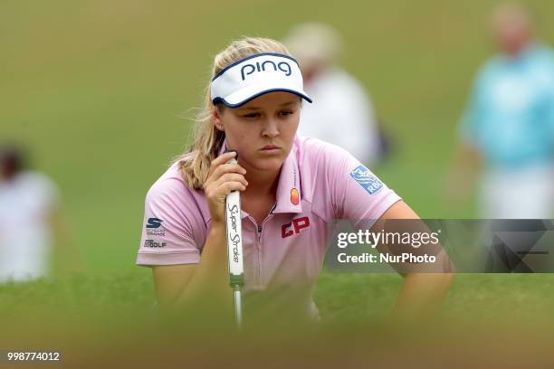 Brooke Henderson of Canada lines up her putt on the second green during the third round of the Marathon LPGA Classic golf tournament at Highland...