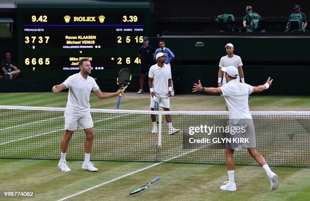 Player Mike Bryan and US player Jack Sock celebrate after beating South Africa's Raven Klaasen and New Zealand's Michael Venus 6-3, 7-6, 6-3, 5-7,...