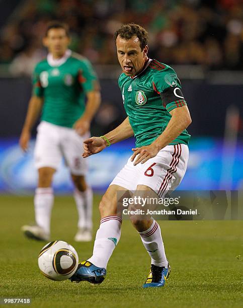 Gerardo Torrado of Mexico passes the ball against Senegal during an international friendly at Soldier Field on May 10, 2010 in Chicago, Illinois....