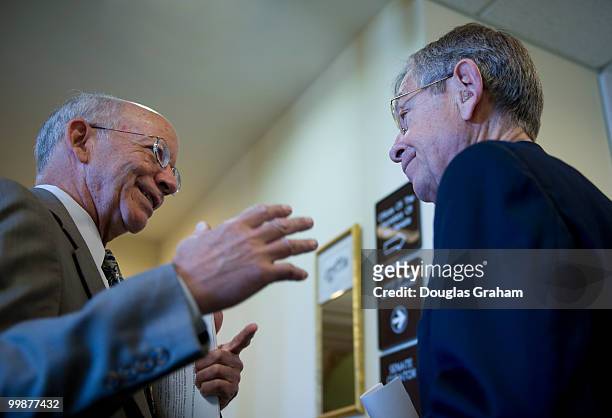 Peter DeFazio, D-OR., and George Voinovich, R-OH., talk before the start of the press event on the real stimulus and highways in the Senate Radio and...