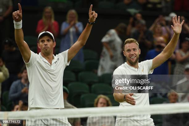 Player Mike Bryan and US player Jack Sock celebrate after beating South Africa's Raven Klaasen and New Zealand's Michael Venus 6-3, 7-6, 6-3, 5-7,...