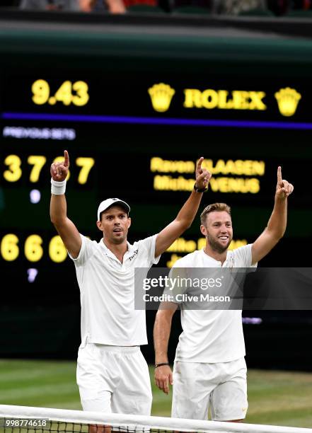 Mike Bryan and Jack Sock of The United States celebrate their victory against Raven Klaasen of South Africa and Michael Venus of New Zealand after...