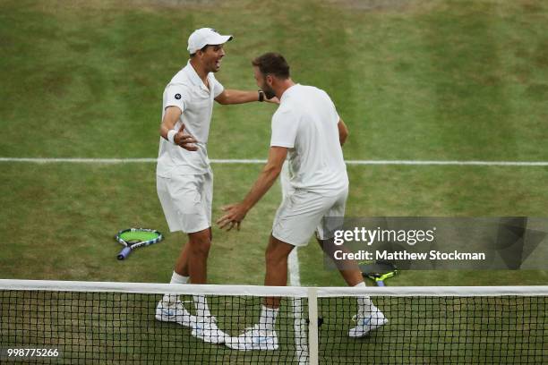 Mike Bryan and Jack Sock of The United States celebrate their victory against Raven Klaasen of South Africa and Michael Venus of New Zealand after...