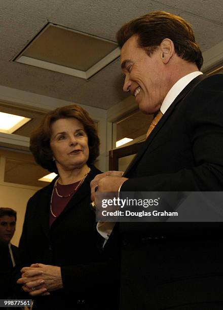 Gov. Arnold Schwarzenegger, R-Calif., meets the press with Dianne Feinstein, D-CA., after a closed meeting in her office in the Hart Senate Office...
