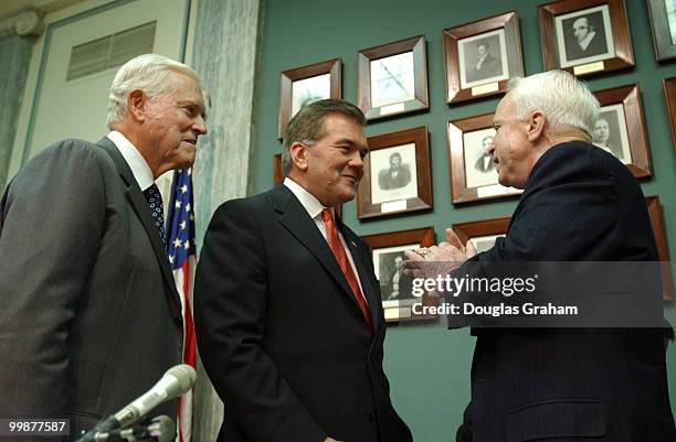 Ernest F. Hollings, D-S.C., Secretary of Homeland Security, Tom Ridge, and Johnn McCainn, R-AZ., talk before the start of the Senate Commerce,...