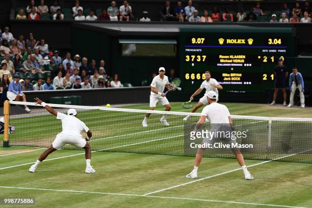 Raven Klaasen of South Africa and Michael Venus of New Zealand return against Mike Bryan and Jack Sock of The United States during the Men's Doubles...