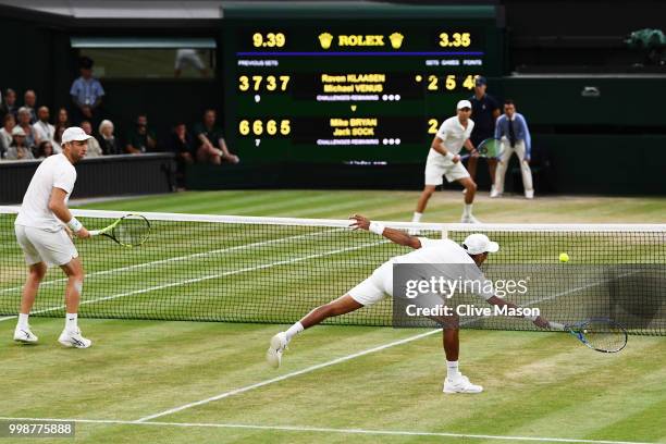 Raven Klaasen of South Africa and Michael Venus of New Zealand return against Mike Bryan and Jack Sock of The United States during the Men's Doubles...