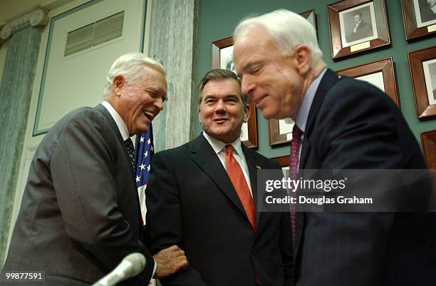 Ernest F. Hollings, D-S.C., Secretary of Homeland Security, Tom Ridge, and Johnn McCainn, R-AZ., talk before the start of the Senate Commerce,...