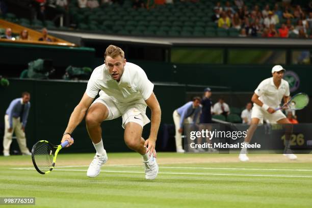 Mike Bryan and Jack Sock of The United States return against Raven Klaasen of South Africa and Michael Venus of New Zealand during the Men's Doubles...