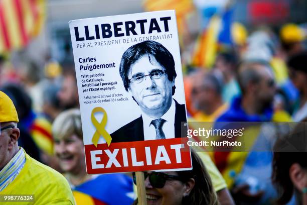 Banner of the exiled Catalonia president in Germany Carles Puigdemont during the demonstration of Independence political parties and independence...