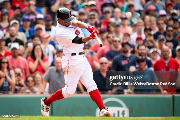 Xander Bogaerts of the Boston Red Sox hits a walk-off grand slam home run during the tenth inning of a game against the Toronto Blue Jays on July 14,...