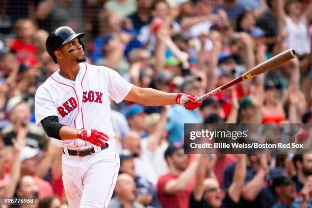 Xander Bogaerts of the Boston Red Sox hits a walk-off grand slam home run during the tenth inning of a game against the Toronto Blue Jays on July 14,...