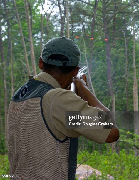 William J. Jefferson nails a clay target on the sporting calys range during the 10th Annual Great Congressional Shoot-Out at Prince George's Shooting...