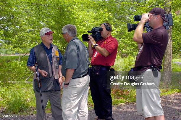Don Sherwood is interviewed by TV crews during the 10th Annual Great Congressional Shoot-Out at Prince George's Shooting Center in Glenn Dale,...