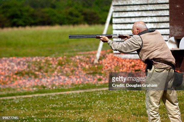 John Dingell lines up a target on the skeet range during the 10th Annual Great Congressional Shoot-Out at Prince George's Shooting Center in Glenn...