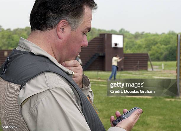 Dennis Cordoza works from the trap feild on his "Black Berry" during the 10th Annual Great Congressional Shoot-Out at Prince George's Shooting Center...